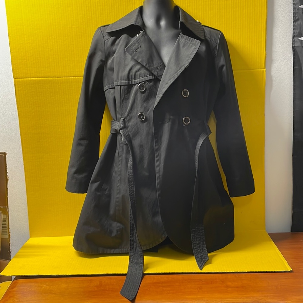 Guess women’s black large trenchcoat with tie. Preowned and great condition.
